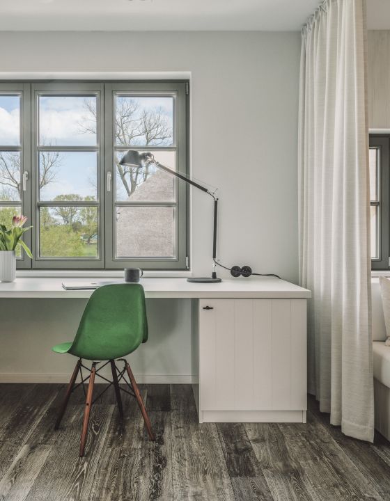 Eames Chair gruen Ferienwohnung